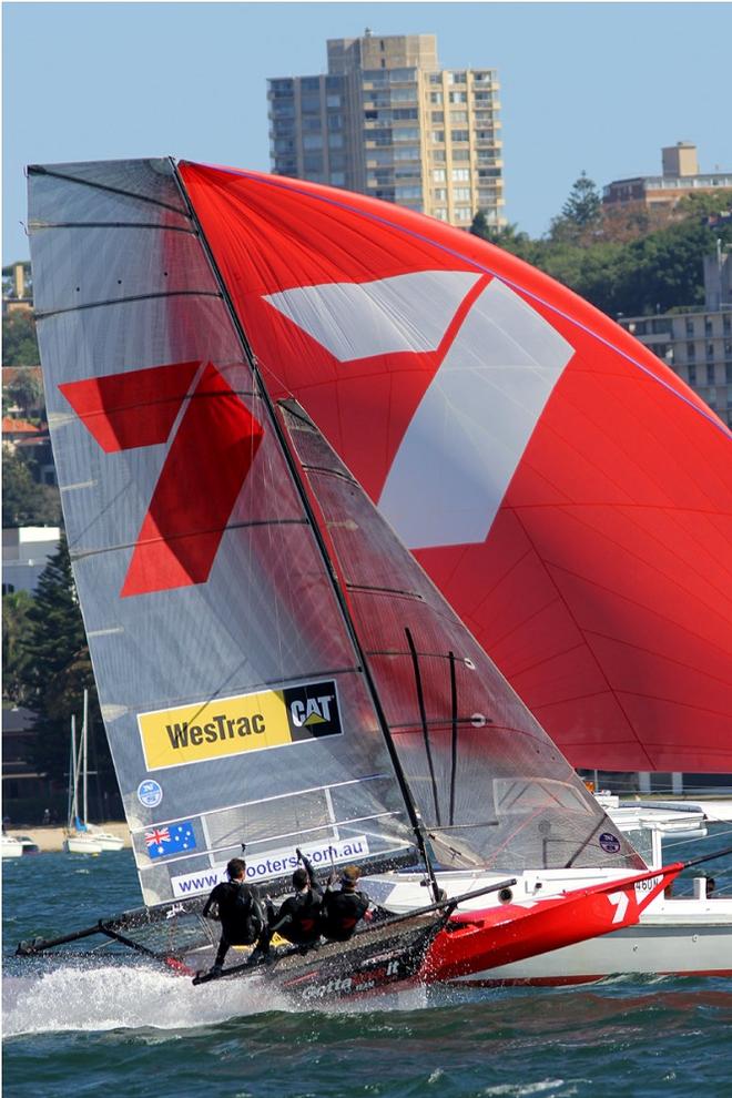 Gotta Love It 7 crosses the finish line a clear winner of Race 3 - 2015 JJ Giltinan 18ft Skiff Championship © Frank Quealey /Australian 18 Footers League http://www.18footers.com.au